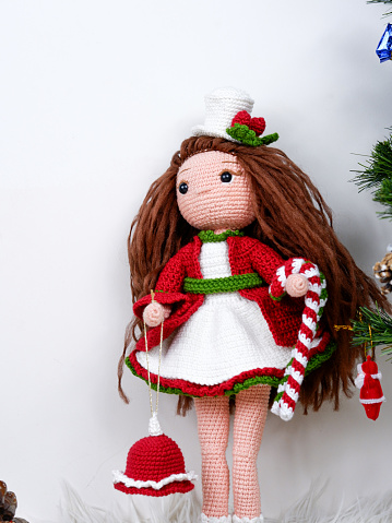 amigurumi doll with red clothes