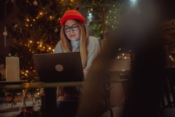 istock Female student studying while sitting in the hotel lobby 1450081751