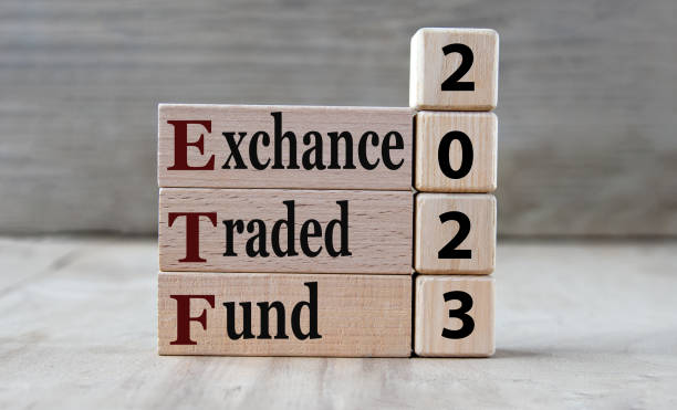 istock EXCHANCE TRADED FUND 2023 - words on wooden blocks on gray background 1450081925