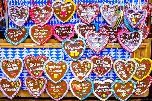 Munich, Germany - September 30:Typical ginger bread heart souvenir at a kiosk on the Oktoberfest (the world's largest folk festival) in Munich on September 30, 2022
