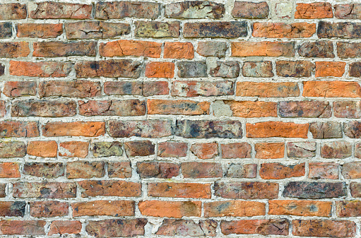Brick wall. Full frame, seamless (tileable repeating) pattern, texture or background, with old UK bricks