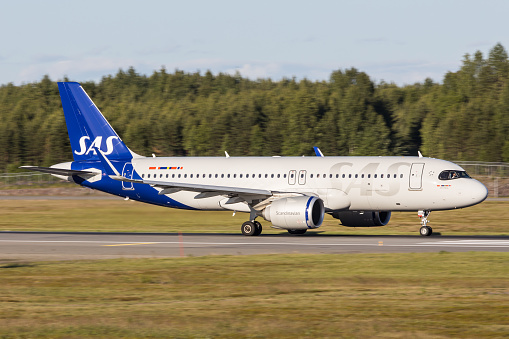 An Airbus A320 of carrier SAS Scandinavian Airlines lining up the runway in Oslo