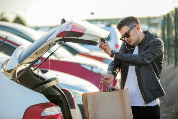 Young Man Shopping, Using Phone , Texting, City Life