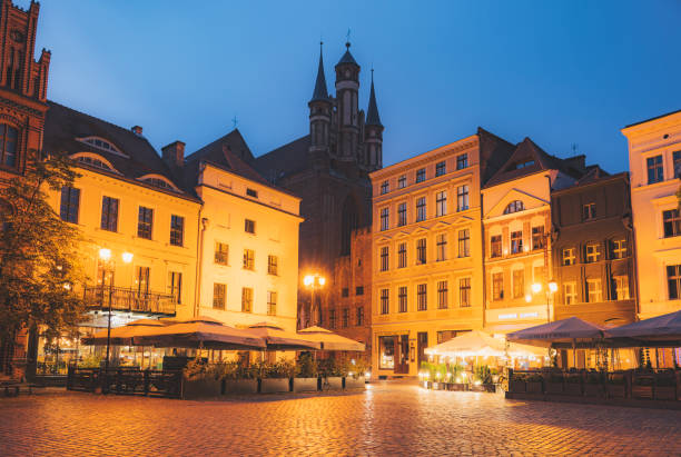 istock Old town Torun by night , Poland 1450111268