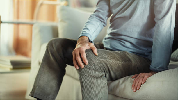 istock Old man suffering from knee pain 1450113883