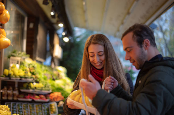 istock Young couple while shopping at the local grocery 1450122480