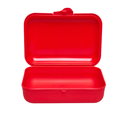 Small red recycling bin on a red background with copy space