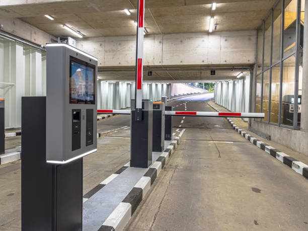 istock Barrier at Entrance and Exit of a car Parking garage 1450124496