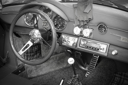 Vintage Porsche steering wheel, car stereo. Close up of Vintage Porsche interior Gökçeada, Çanakkale Türkiye-June 16, 2021