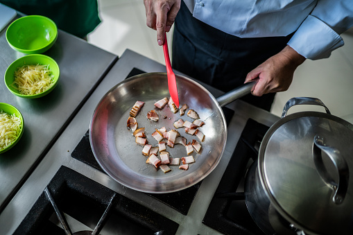 Chef preparing food in a commercial kitchen