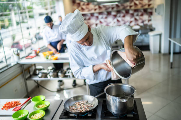 istock Chef cooking in a commercial kitchen 1450132570