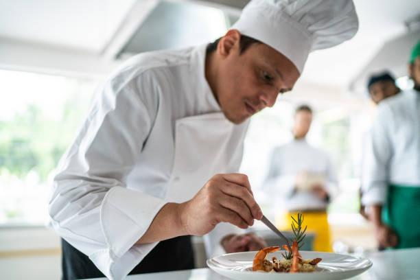 istock Chef arranging details in a pasta dish 1450133928
