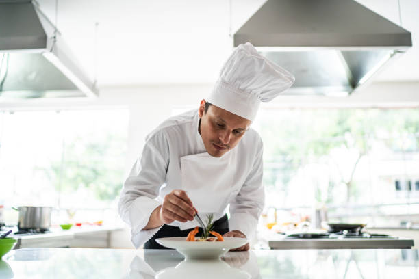 istock Chef arranging details in a pasta dish 1450133935
