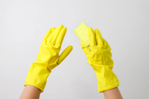 istock yellow gloves for cleaning on a white background 1450134009