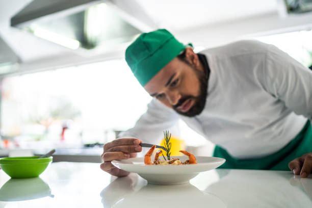 istock Chef arranging details in a pasta dish 1450134010