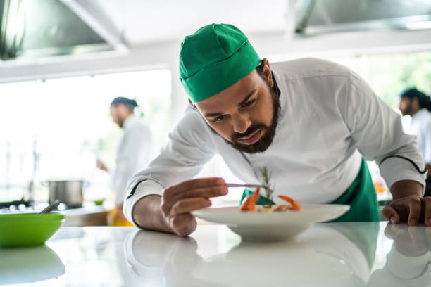 istock Chef arranging details in a pasta dish 1450134011