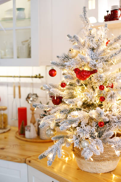 istock kitchen in scandinavian christmas decor. christmas tree decor in the kitchen. 1450138303