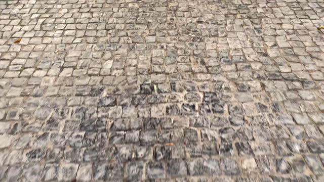 Walking over stone paved floor