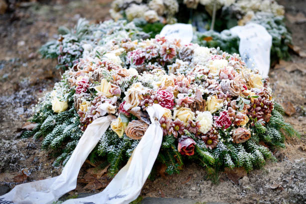 istock funeral wreath with bow and colorful pastel flowers 1450148803
