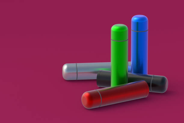 istock Thermoses of different colors on red background. Metallic thermo flasks. Space for text. 3d rendering 1450161053