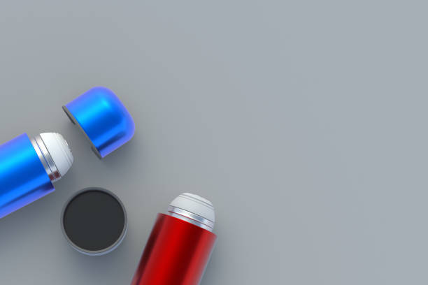 istock Thermoses on gray background. Metallic thermo flasks. Top view. Copy space. 3d rendering 1450161302
