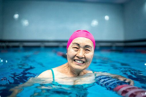 Portrait of a senior woman in the swimming pool