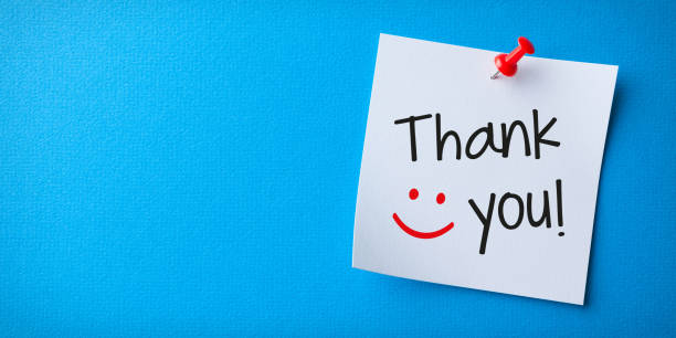 istock White Sticky Note With Thank You And Red Push Pin On Blue Cardboard 1450178343