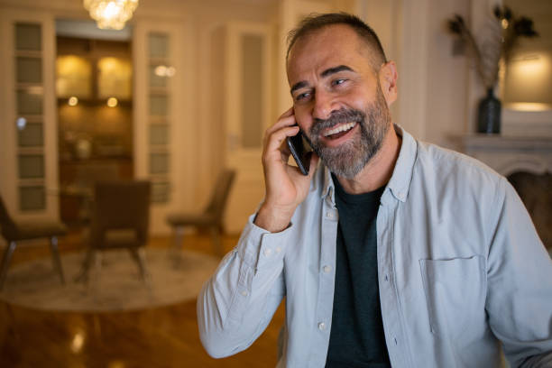 istock Portrait of a mid asult man using smartphone 1450178416