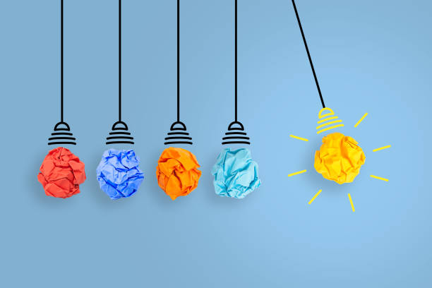 istock Creative Idea Concepts with Light Bulb Crumpled Paper on Blue Background 1450178485