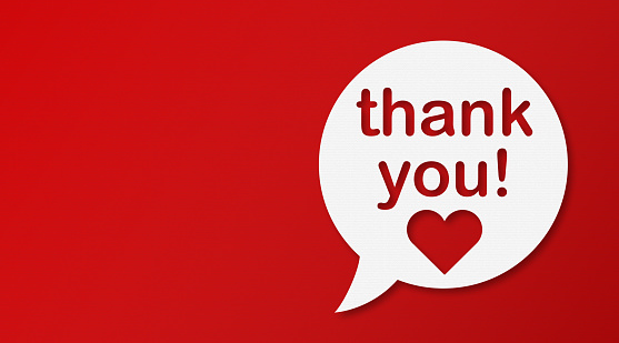 Thank You and Speech Bubbles with Copy Space On Red Cardboard Background