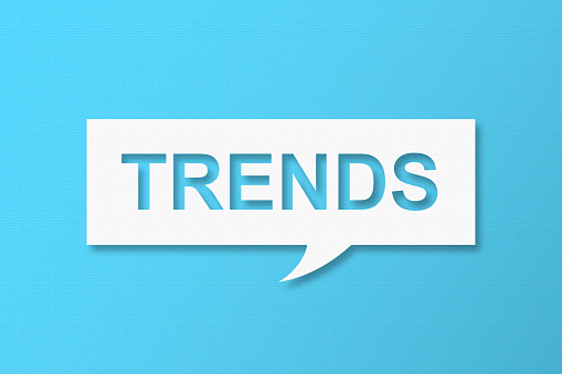 Trends Speech Bubbles with Copy Space On Blue Cardboard Background