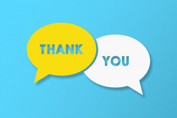 istock Thank You and Speech Bubbles with Copy Space On Blue Cardboard Background 1450180725