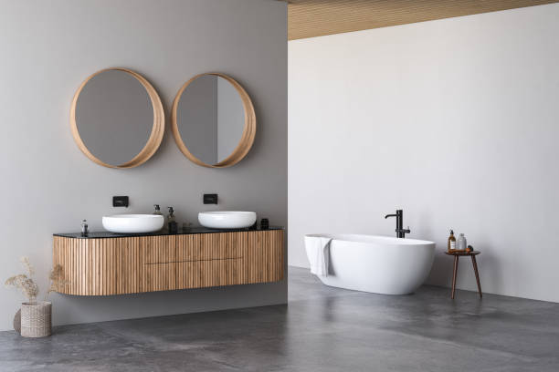 istock Modern bathroom interior with white walls, marble basin with double mirror, bathtub, a open air shower and grey concrete floor. Minimalist beige bathroom with modern furniture. 3D rendering 1450185031
