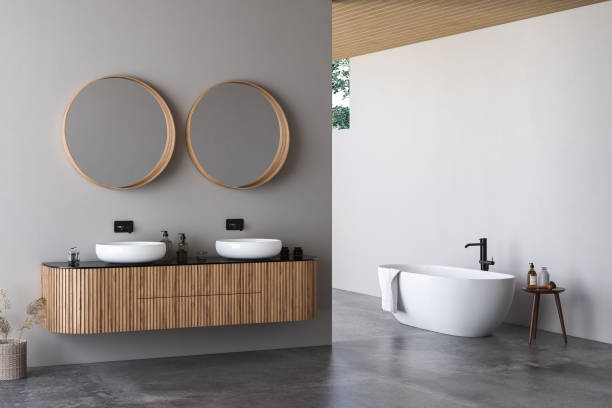 istock Modern bathroom interior with white walls, marble basin with double mirror, bathtub, a open air shower and grey concrete floor. Minimalist beige bathroom with modern furniture. 3D rendering 1450186041