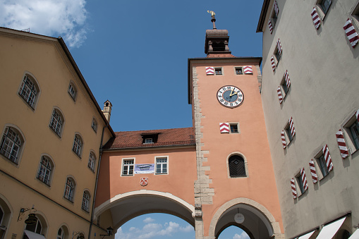 Regensburg, Germany - July 23, 2021: The medieval Brückturm (Bridge Tower), the only surviving tower of the Stone Bridge.