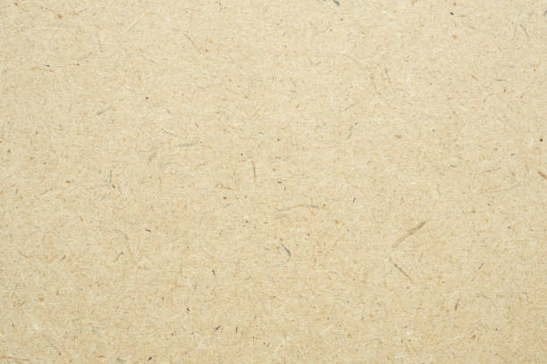 istock Old brown recycle cardboard paper texture background 1450191494