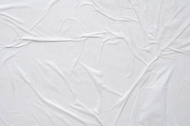istock white crumpled and creased paper poster texture background 1450192132