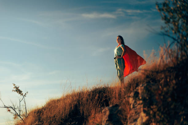 istock Superhero Woman Standing with Arms on her Hips 1450202887