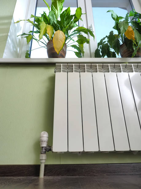 istock metal radiator with heat regulator 1450205550
