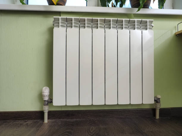 istock metal radiator with heat regulator 1450205555