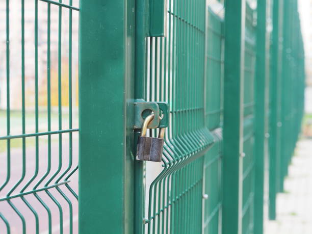 istock The green railing of the stadium 1450205575