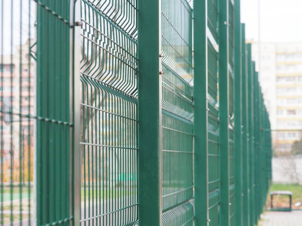 istock The green railing of the stadium 1450205577