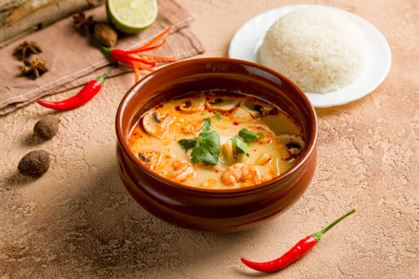 istock Tom Yam soup with shrimps and boiled rice 1450206936