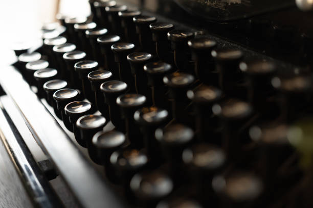 istock vintage typewriter keys with selective focus. Antique Typewriter. 1450207443