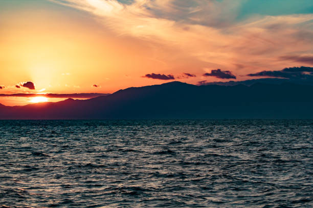 istock Colorful sunset over a lake 1450220051
