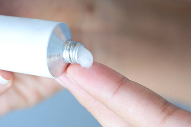 istock The woman's hand, she uses steroids Apply External type 1450228562