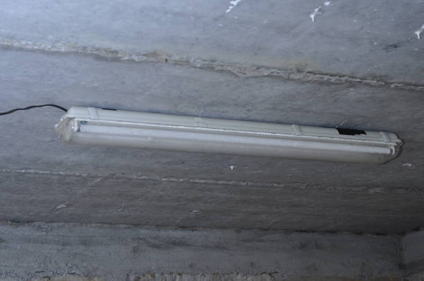 istock old ceiling lamp with long lamps in the basement on the concrete ceiling 1450233675