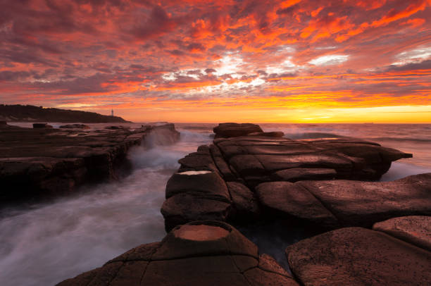 istock Fiery red autumn sky at Soldiers Point Australia 1450237998