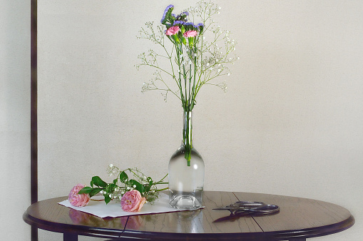 Flower Arrangement on the Wooden Table/Studio Shot