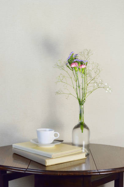 Flower Arrangement on the Wooden Table/Studio Shot